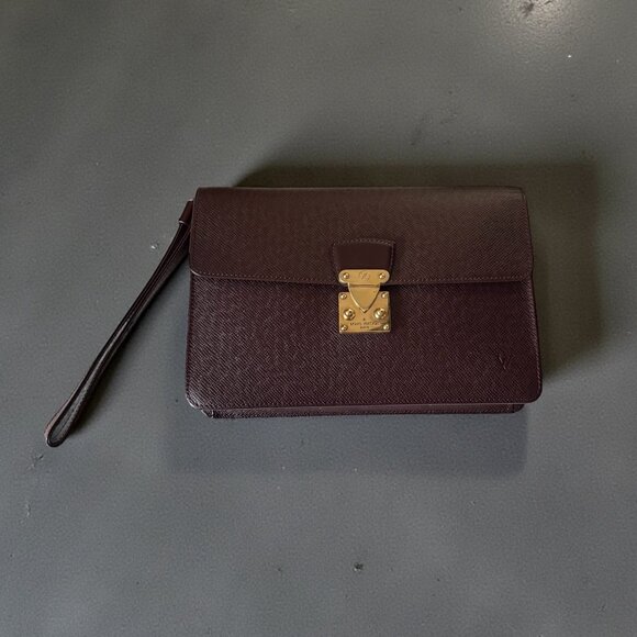 Louis Vuitton Handbags - Louis Vuitton Taiga Leather Kourad Clutch | Bordeaux